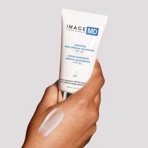 Image MD Restoring Daily Defense Moisturizer SPF 50 là kem chống nắng phổ rộng, chống UV/HEV và ngăn chặn hình thành sắc tố.